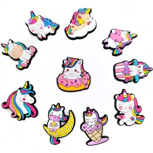 Set of 10 colorful PVC unicorn shoe charms with rainbow and donut designs for clogs