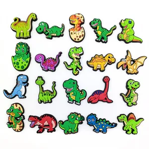 Set aus 19 bunten PVC-Cartoon-Dinosaurier-Schuhanhängern für Clogs und Gartenschuhe