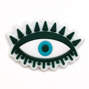 Green Evil Eye charm for clogs, handcrafted PVC shoe decoration with eyelashes