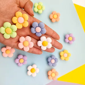 Colorful resin flower shoe charms and DIY craft accessories in vibrant pastel colors