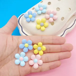Colorful resin flower shoe charms for clogs in pastel blue pink and yellow colors