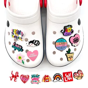 Self-care themed PVC charms set for clogs featuring rainbow and heart illustrations