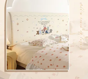 Close-up of beige velvet headboard cover with cute cartoon dog patterns and quotes