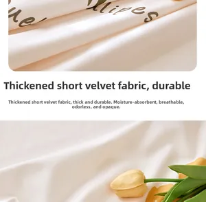 Detail of thickened short plush fabric with yellow tulips and breathable texture