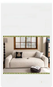 Detail of jacquard fleece sofa cover featuring cream wave texture and stretch fabric