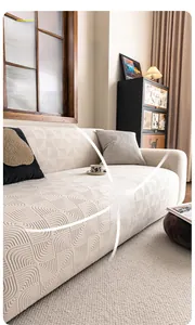 Detailed close-up of cream wheat leaf jacquard velvet sofa cover with high elastic texture