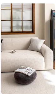 Detail of off-white wheat leaf jacquard velvet fabric with 3D wave texture for sofa cover