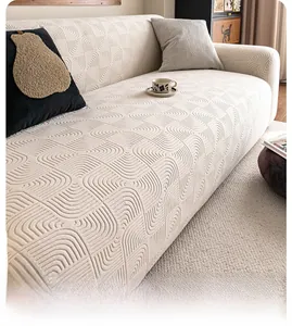 Macro detail of creamy white polar fleece sofa cover showing wavy 3D texture and soft fabric