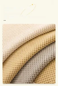 Detail of waffle textured corduroy sofa cover with eco-friendly reactive dyeing fabric
