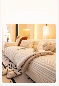 Close-up of cream flannel sofa cover featuring thick wavy corduroy texture and plush fabric