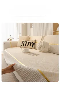 Detail of luxury chenille sofa cover with wavy texture and elegant pleated skirt