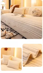 Detail of cream white flannel sofa cover featuring thick striped plush texture and matching pillows
