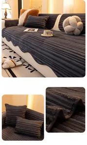 Detail of dark grey ribbed thickened flannel sofa cover with wavy lace edges and pillows