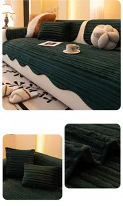 Detailed close-up of dark green corduroy sofa cover texture and matching cushions