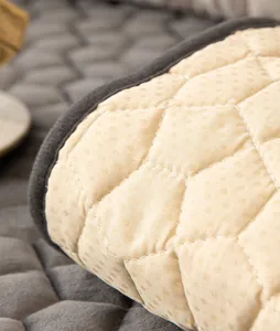 Detail of the non-slip backing with silicone dots and diamond quilted flannel fabric