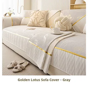 Detail of gray chenille sofa cover with golden lotus patterns and pleated skirt edges