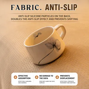 Thick cream-style non-slip sofa cover showing high-adhesion silicone backing with ceramic cup