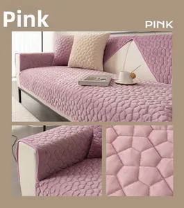 Macro detail of pink flannel sofa cover showing hexagonal quilting and soft plush texture