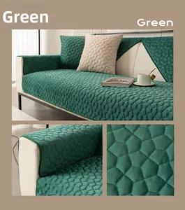 Detailed pentagonal quilting on green velvet sofa cover with non-slip hemmed edges