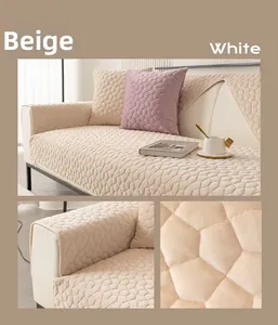 Detail of beige flannel sofa cover featuring a modern hexagonal honeycomb quilted texture