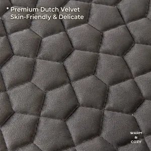 Modern minimalist dark gray Dutch velvet sofa cover with hexagonal quilting detail