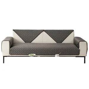 Modern minimalist dark grey flannel sofa cover with honeycomb quilting and non-slip backing