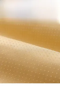 Close-up of non-slip rubber particles on the thickened rabbit fur warm seat cushion base