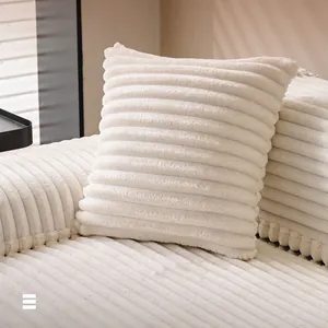 Luxurious white faux fur pillow with elegant striped texture and plush velvet finish