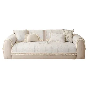 Housse de canapé en polaire beige épaisse avec jacquard d'ombre et bord à franges