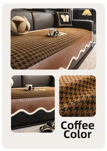 Detail of coffee brown houndstooth sofa cushion with leather edges and plush wave trim