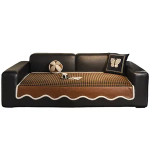 Houndstooth non-slip sofa cover with leather trim and decorative matching pillows