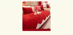 Detail of red plush sofa cushion with wave edges and festive pattern for winter decor