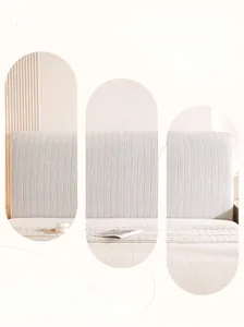 Detail of cream pleated headboard cover featuring high elasticity and vertical ribbed texture