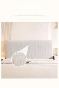 Detail of high elasticity fabric with vertical striped texture on a modern bed headboard cover