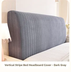 Close-up of the vertical striped texture on the dark grey elastic headboard cover