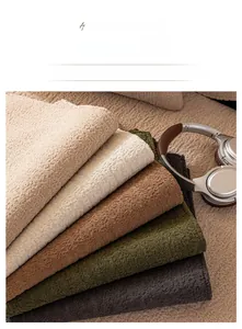 Detail of soft textured chenille sofa cover fabric in various earthy neutral colors