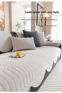 Detail of cream chenille sofa cushion with textured fish scale pattern and soft fabric