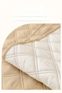 Detail of anti-slip silicone particles on the back of the linen sofa cushion cover