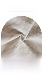 Close-up of beige chenille sofa fabric with striped and honeycomb weave texture