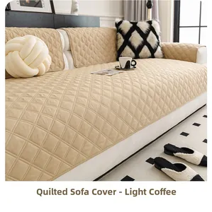 Detail of light coffee quilted sofa cover with diamond lattice texture on white sofa