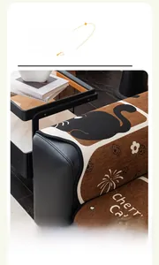 Detailed close-up of chenille sofa protector featuring a cute cat and floral embroidery