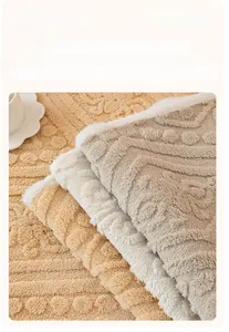 Macro detail of cream-colored plush sofa cover with reactive dyeing and cable knit texture