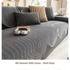 Detail of dark grey chenille sofa cover with quilted stripe and fish scale patterns