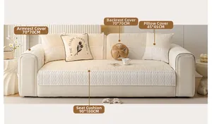 Detail of cream chenille sofa cover set with lace trim edges and soft textured fabric