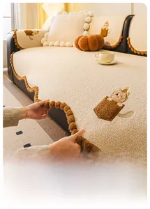 Plush teddy velvet sofa cover with cute cat embroidery and brown pompom wave edges