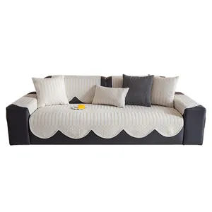 Minimalist beige chenille sofa cover set with scalloped edges and quilted texture