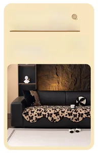 Detail of plush leopard print faux fur sofa cover with decorative wavy scalloped edges