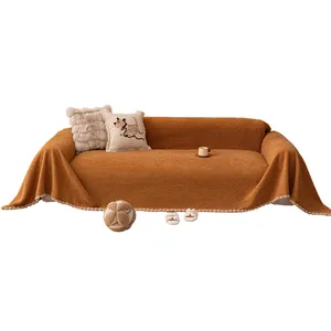 Housse de canapé épaisse en polaire teddy caramel avec bordure à pompons décorative