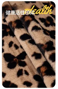 Close-up of leopard print plush sofa cover fabric showing soft high-weight faux fur texture