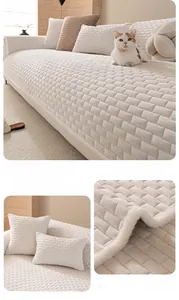 Close-up of thick cream velvet sofa cushion featuring 3D square grid texture and plush edges